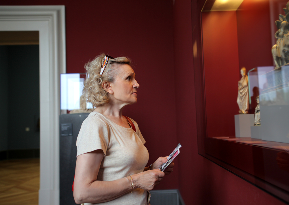 senior woman visiting a musem.jpg